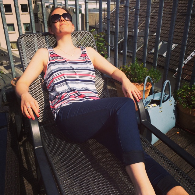 Enjoying the good life - roof top tanning!