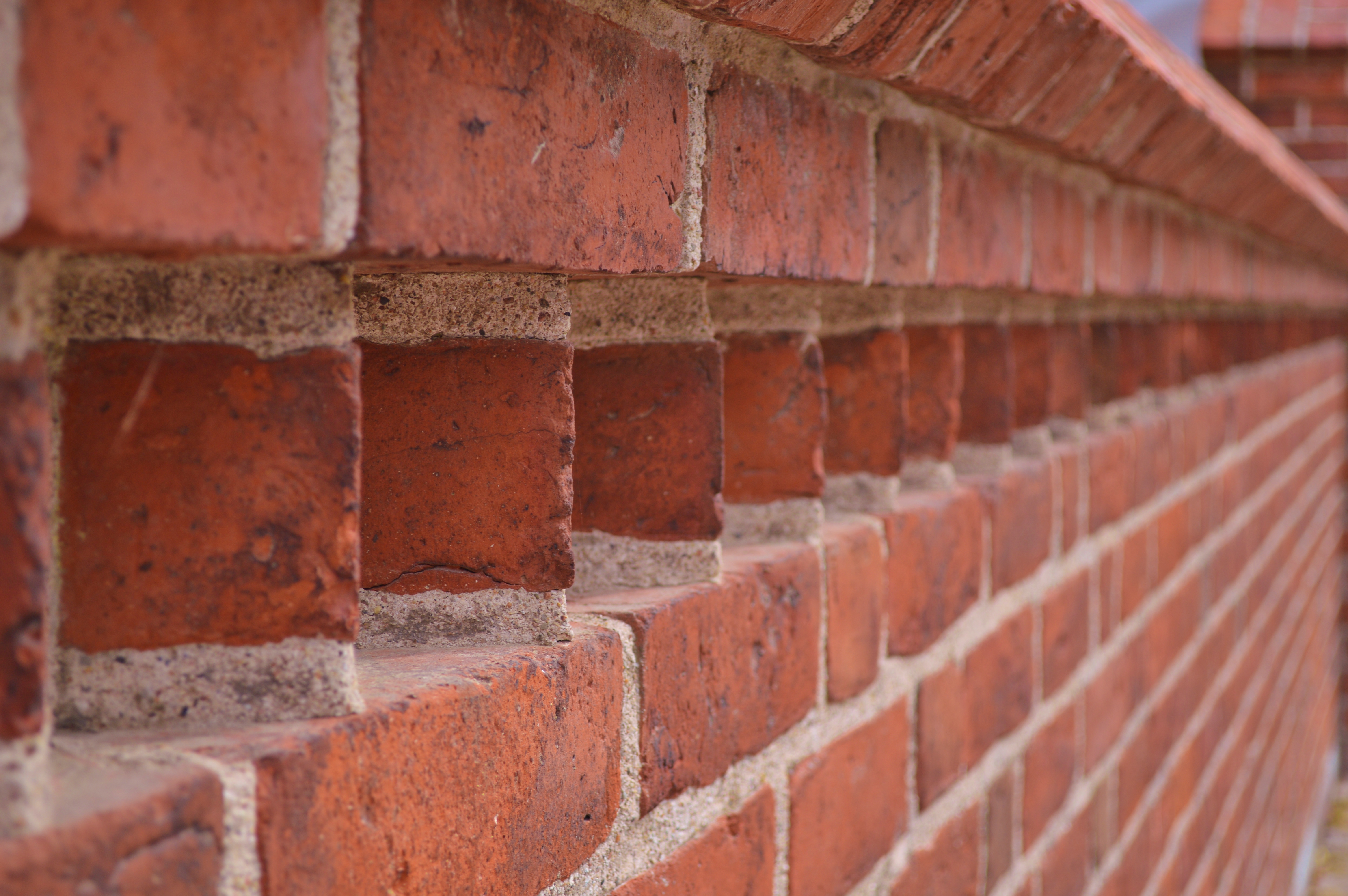 A brick wall at the monastery cemetery
